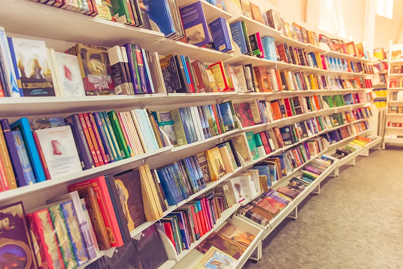 Bookstore shelves filled with colorful books