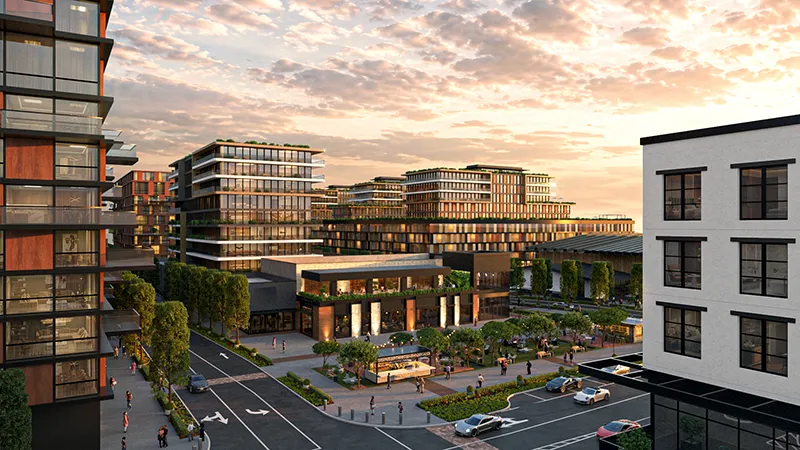 Rendering of Uptown's streetscape and plaza at sunset