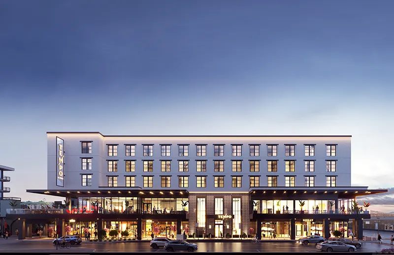 Rendering of a hotel exterior with ground-floor dining at dusk