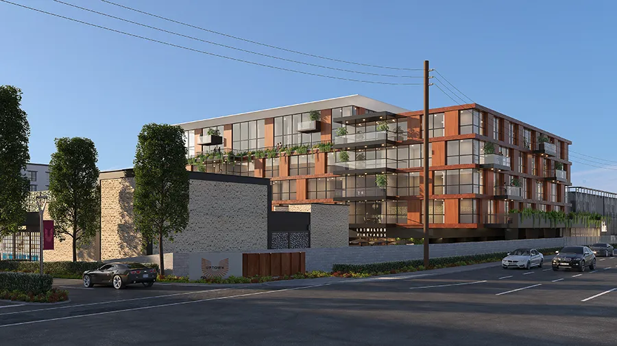 Rendering of a residential building with balconies along a tree-lined street