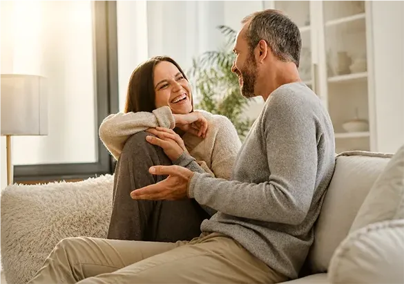 Residents enjoying modern indoor living and natural light inside a luxury apartment home at The Astrie