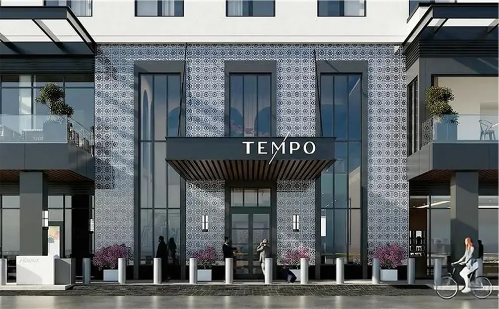 Exterior entrance and modern tiled facade of Tempo by Hilton Tucson Uptown hotel